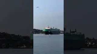 Small boat cuts off carrier. #ocean #sailing #boat #ship #sea #navy #captain #maritime #california