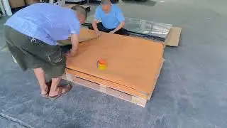 Pack the goods with kraft paper and wooden frame