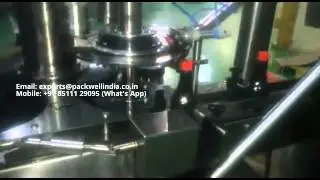 COUGH SYRUP FILLING WITH PICK AND PLACE CAPPING