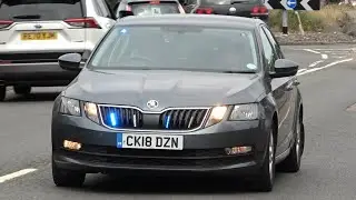 Surrey Police, Driver Training Unit, Unmarked Skoda Octavia, on blue light run in Guildford. 