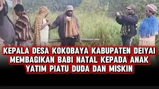 kabupaten Deiyai kepala desa kokobaya Marianus edowai membagikan babii natal kepada anak yatim piatu