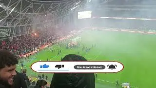 St Patrick Athletic's players celebrate with their fans after winning the 2023 FAI Cup