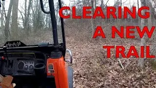 clearing a NEW TRAIL in the woods!