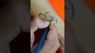 Making a DIY temporary simple tribal eagle tattoo on hand with pen #shorts #viral #trending #tattoo
