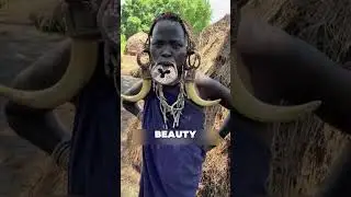 Why this tribe wear large lip plates #african