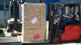 Stationay Pallet Changer   Transferring goods to Push Pull attachment
