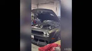 Boosted widebody scatpack makes 933whp and goes 9s