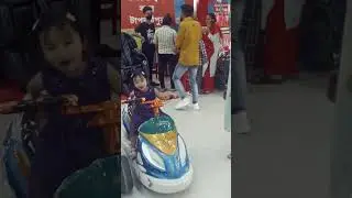my little princess enjoying  driving and riding   with toy car at Big bazaar silchar .spent time####
