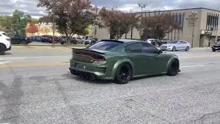 This Dodge Charger 392 Scatpack Widebody is partially debadged and has other mods.