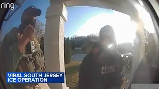 Viral video of masked federal agents confronting resident draws criticism