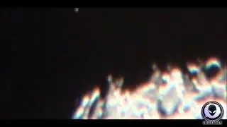 2_14_2014 LARGE UFO SITS ABOVE MOON THEN LANDS ON THE SURFACE! ALIEN COVERUP.mp4