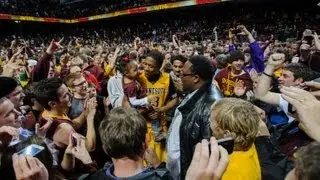 Gopher Fans Storm the Court After Upset of No. 1 Indiana