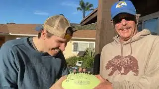 Lucas&rsquo; Fantasy Football &lsquo;25 Champion Jim receives the official trophy from Inaugural &lsquo;24 Champ Kevin
