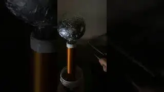 Voltage multiplier driving spark gap tesla coil (near resonance)