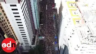 Hong Kong protest: Aerial drone shots show thousands marching