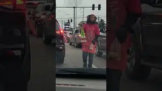 Monkey or Ape? Street walking selling flowers @ Thailand