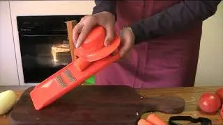 Using the strip slicer to prepare a carrot