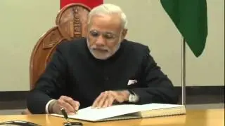 PM Modi Signing the Guest Book at State Palace in Mongolia