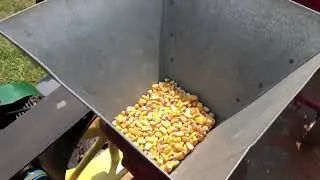 Corn grinder with old hit and miss engine