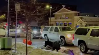 BREAKING Someone throws something at the federal agent at the doorway