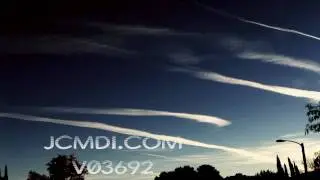 V03692 720p HD Large jet trail accumulation timelapse