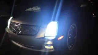 05 Cadillac Sts on 22s with hid lights
