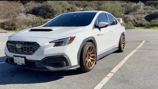 Subaru wrx gets new wheels and sti wing