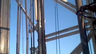 Derrickman latching pipe welcome to the oilfield