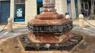 background in the central square in the city of Totana (Spain).
