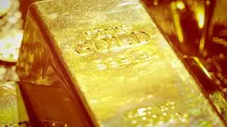 VideoVault Stock Video: A stack of gold bars made of 24 carat gold