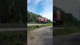 Seriously whistling Dv12 locomotive passing Liminka, Finland