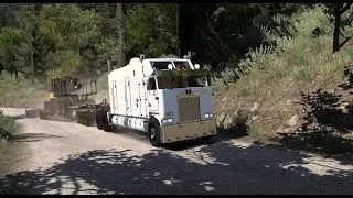 Truck: K100E Long. Trailer: Triple Lowboy. Carga: Cargador forestal - ATS 2026 01 22 00 30 33