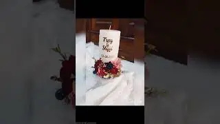 Handmade wedding unity candle with Hand cutout names and wooden base to give rustic look .