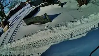 Snow plow with massive tractor