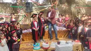 الجانب الاول ومقدمة حفل تخرج تلاميذ الصف الاول والثاني لمدرسة عصر الظهور الاهلية