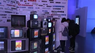 Crypto-art craze reaches China at 'NFT' exhibition | AFP