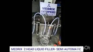 2 HEAD LIQUID FILLER-SEMI AUTOMATIC
