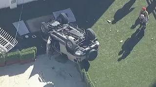 Vehicle drives off edge of parking structure at OC hospital, overturns