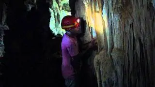 Playing music on stalagmite in Cuba