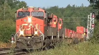 Friendly Crew on a Long Stack Train CN 120 w/DPU Rolling thru Oxford Junction, NS at Track Speed