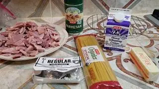 Making fettuccine alfredo with ham