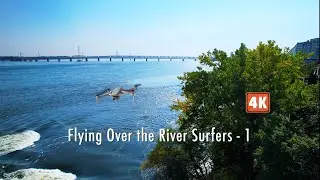 Flying Over the River Surfers - 1 (in 4K)