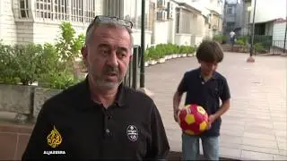Syrian football coach-turned-refugee starts new life in Spain