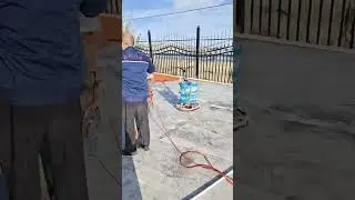 The EPDM floor is being constructed, and the mixer is mixing while the workers are busy. #playground