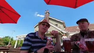 Enjoying the sunshine and a couple of pints with Ken Sabbarton .