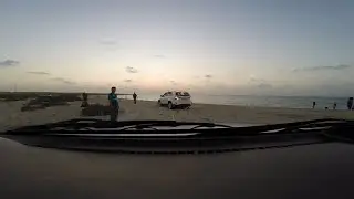 Car stuck on the beach