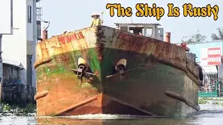 A rusty old cargo ship looks scary