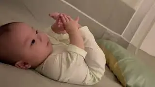 Mom and Dad, your laughter interrupted me from eating my little feet #humancub #