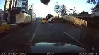 Courierpost van drives thru RED light. Toyota Hiace
