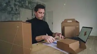 Freelance work at home. Designer creates carton packaging design on computer